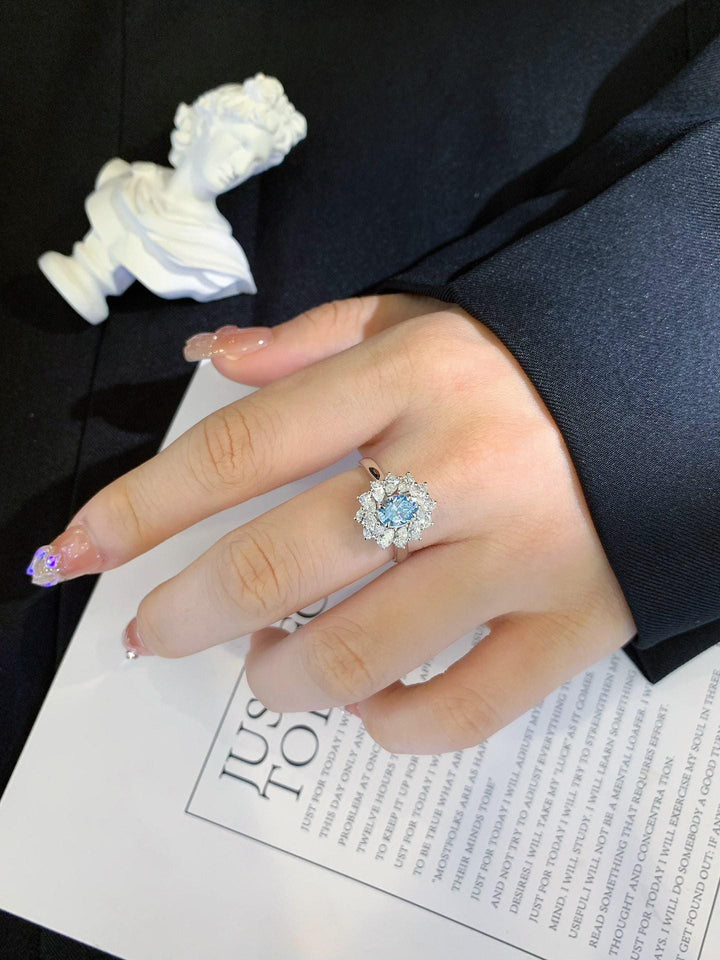The Rarest Blue — Oval Paraiba Three Stone Ring · 18K Gold