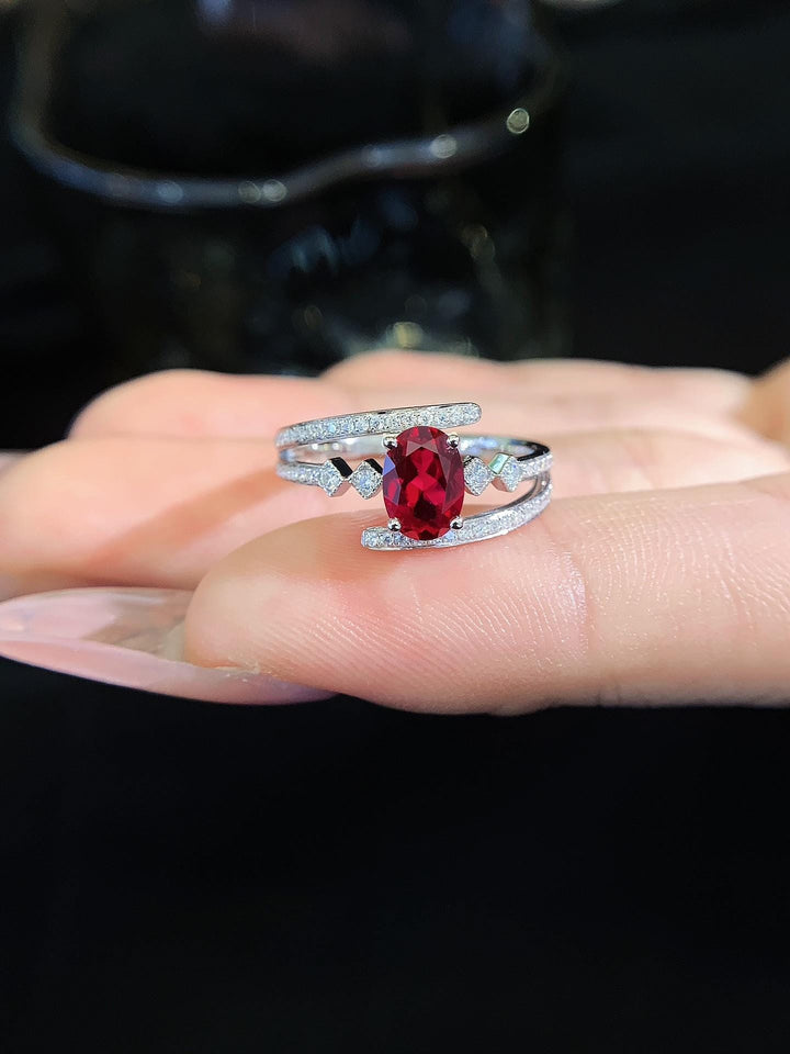 Two Paths, One Stone — Oval Ruby Split Shank Ring · 14K White Gold