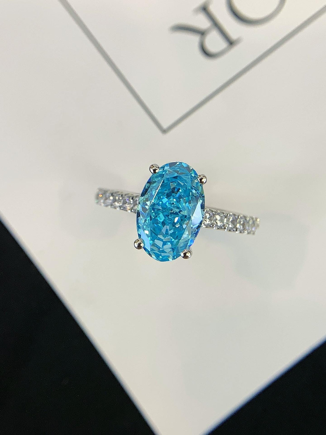 A Promise in Blue — Oval Blue Moissanite Ring · Diamond Band