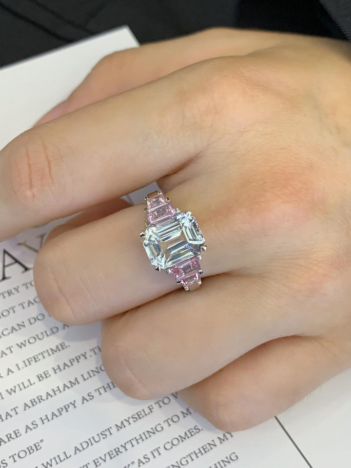 Unexpected and Unforgettable — Emerald Cut Ring · Pink Side Stones, White Gold