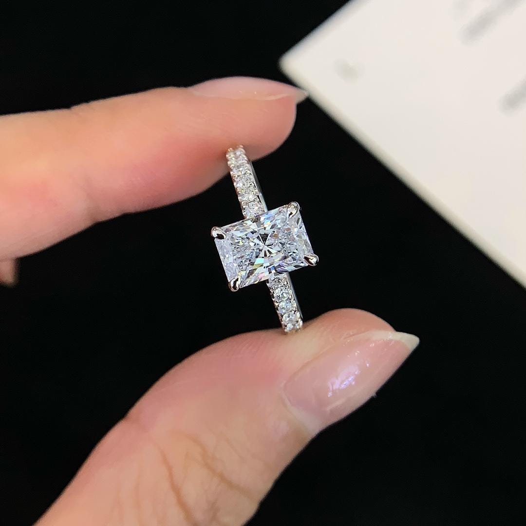 The Long Look — Emerald Cut Diamond Ring · 14K White Gold Pavé Band