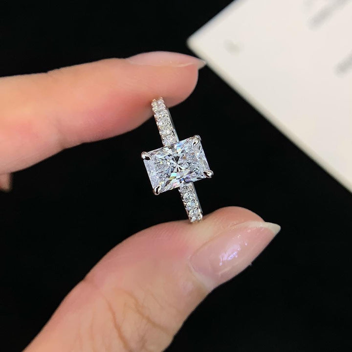 The Long Look — Emerald Cut Diamond Ring · 14K White Gold Pavé Band
