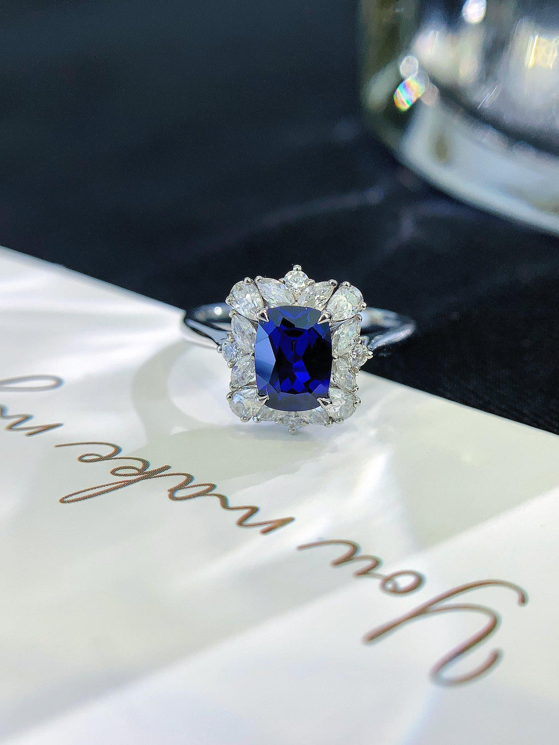Royal Blue, Brilliant White — Cushion Sapphire Halo Ring · 14K White Gold