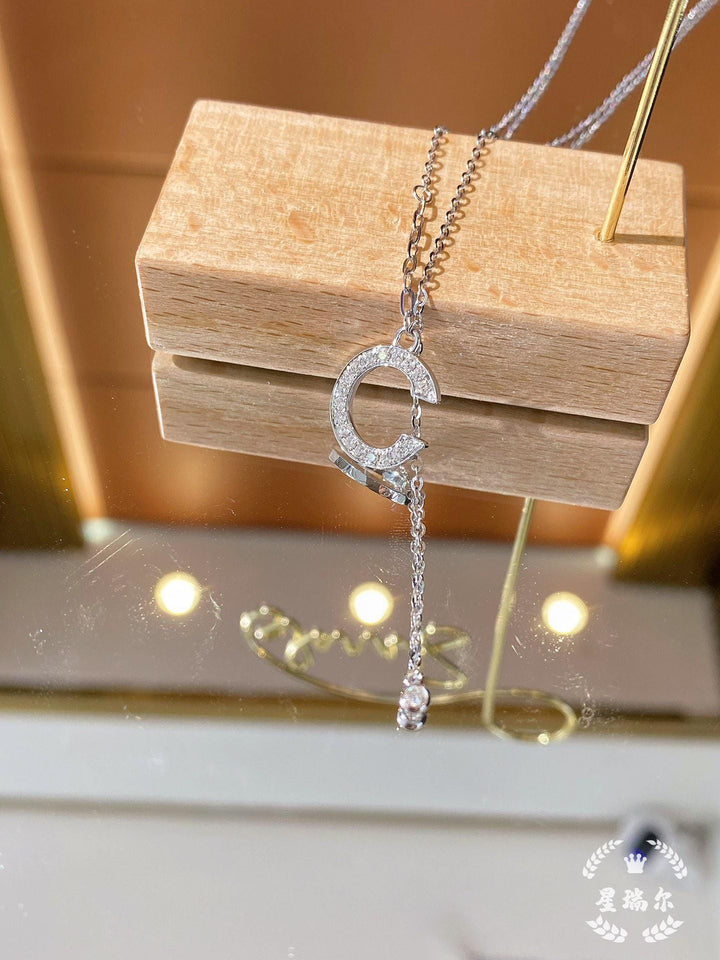 C, at the Collarbone — Diamond Lariat Initial Pendant · Bridal Minimal
