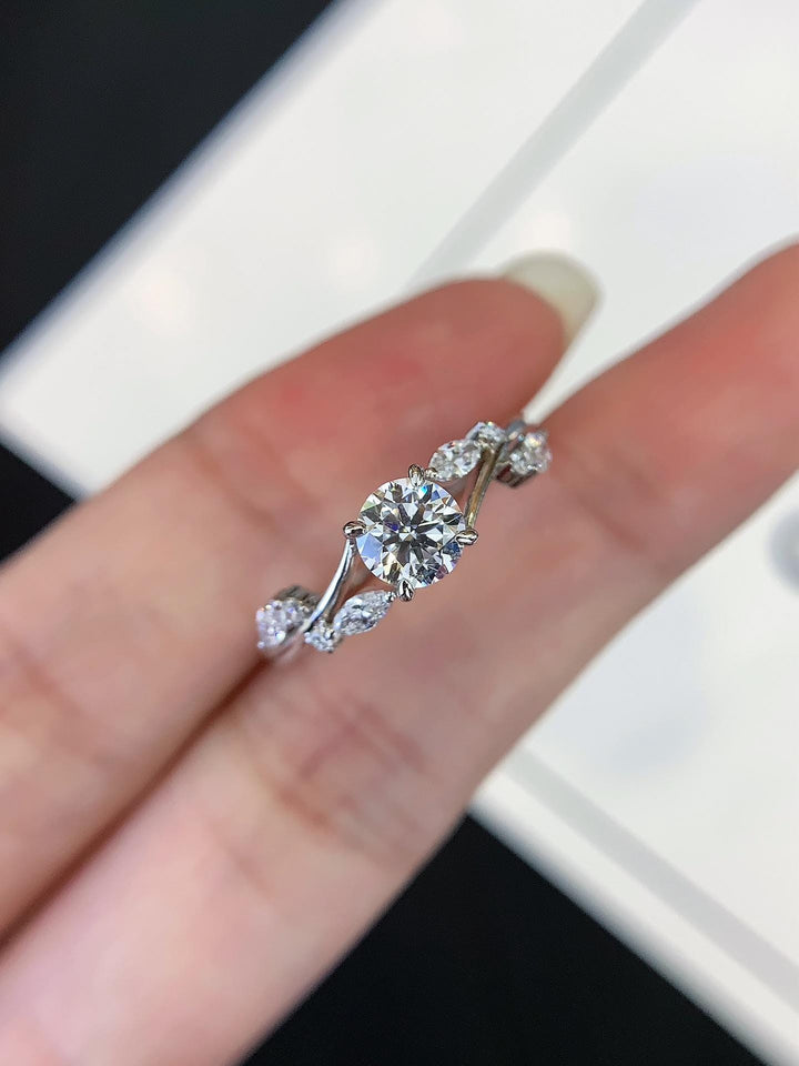 In Motion — Round Diamond Ring · Twisted White Gold Band