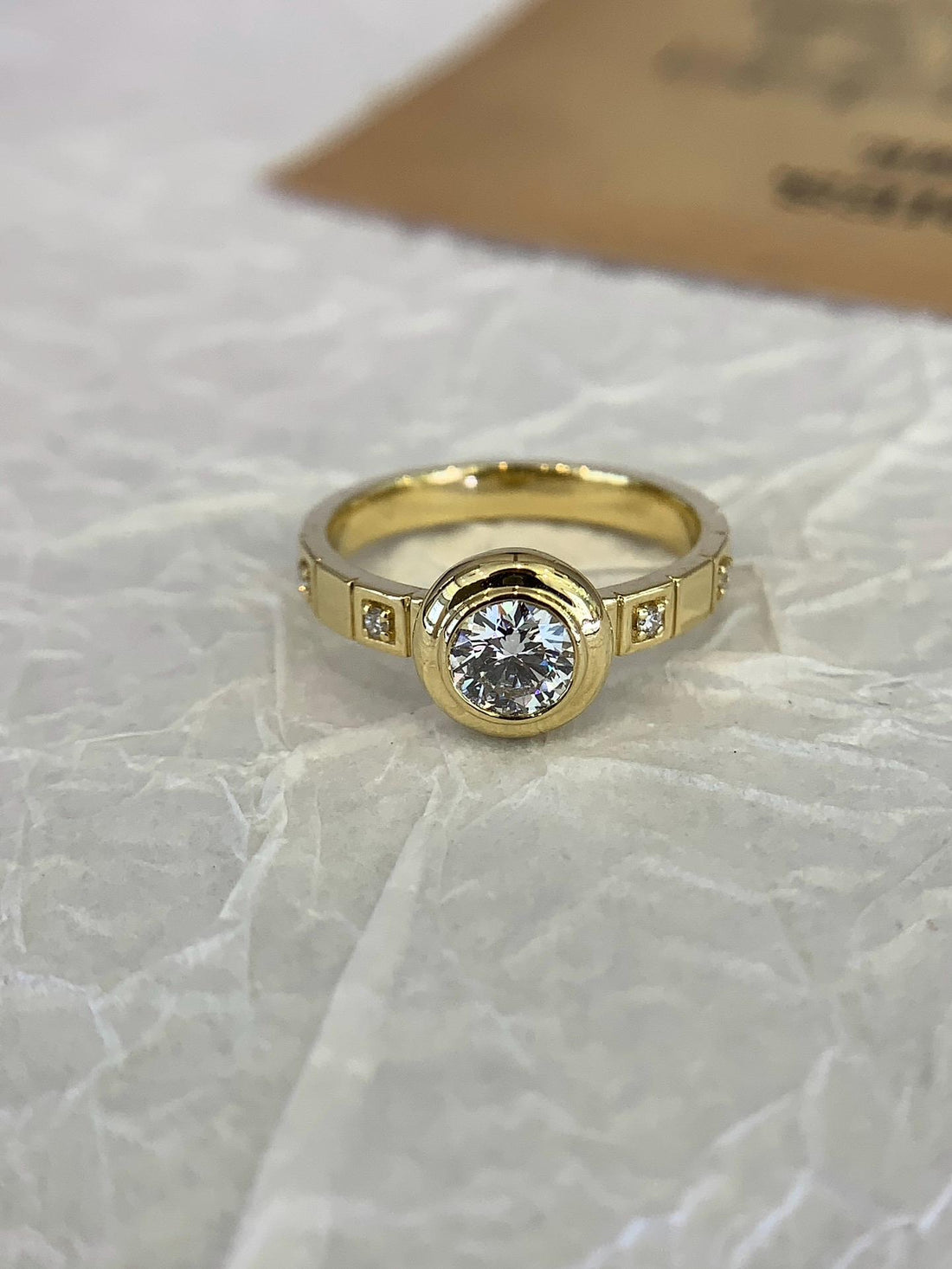 Protected and Perfect — Bezel Set Diamond Solitaire · 14K Gold