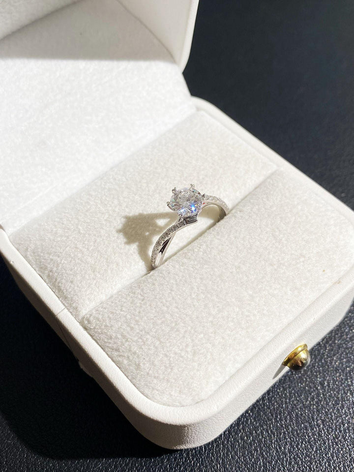 Fire and Light — Round Moissanite Engagement Ring · White Gold Pavé Band