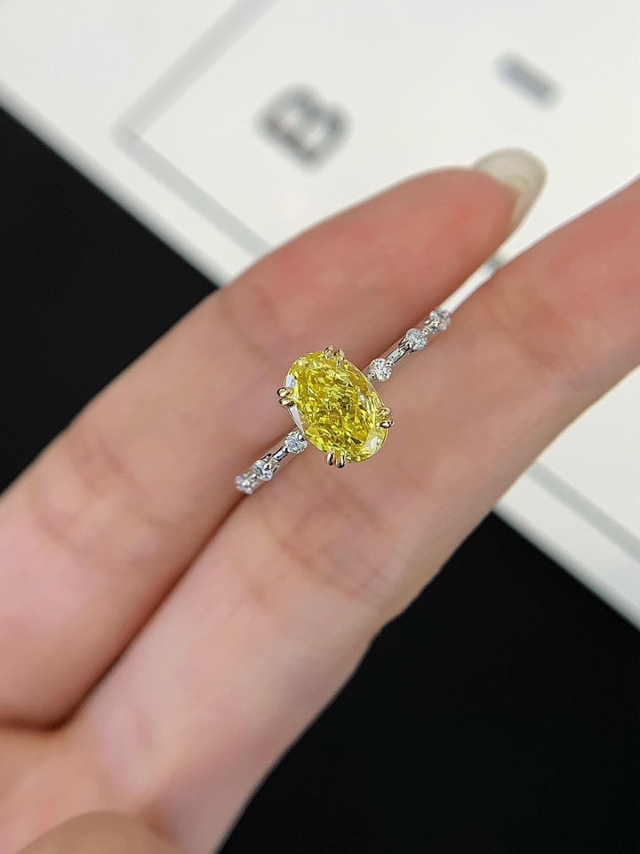 Rare Color, Rare Love — Oval Yellow Diamond Ring · Two-Tone Gold