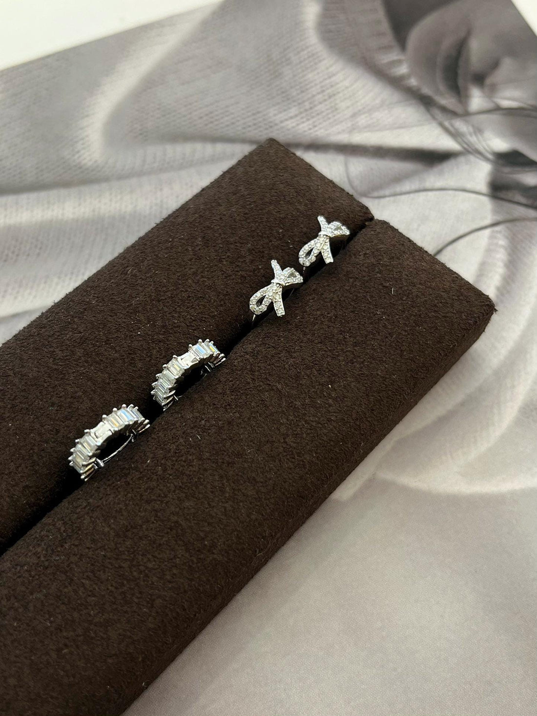 Tied with Diamonds — Bow Stud Earrings · Sterling Silver