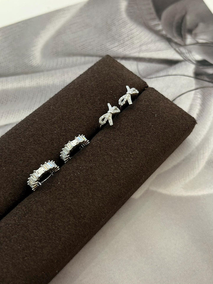 Tied with Diamonds — Bow Stud Earrings · Sterling Silver