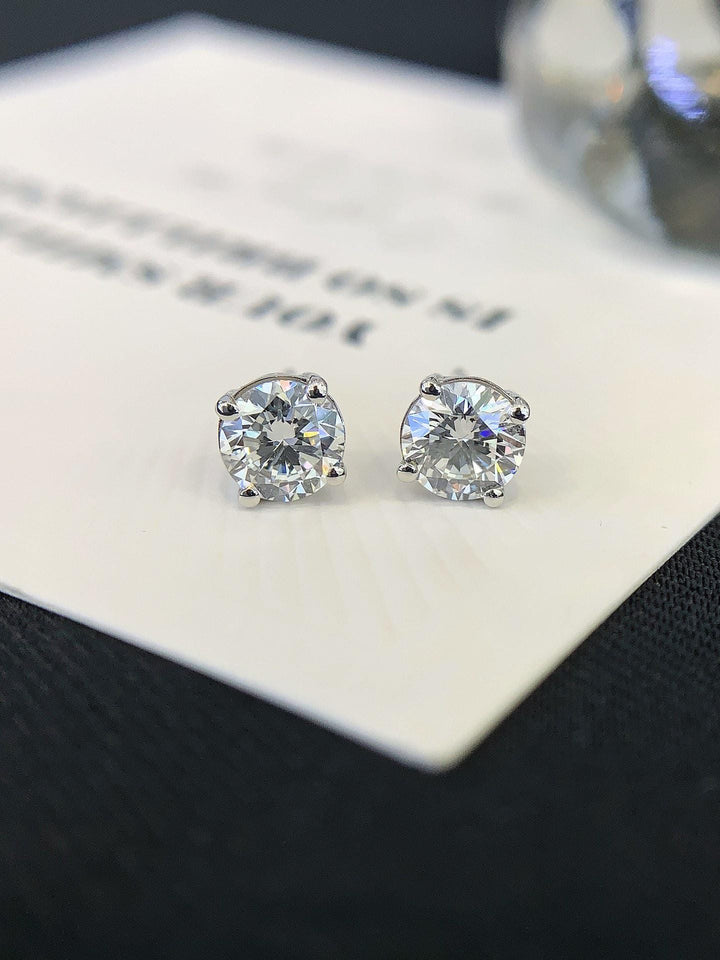 The Earring That Goes With Everything — Round Diamond Studs · 0.20–0.50 CT