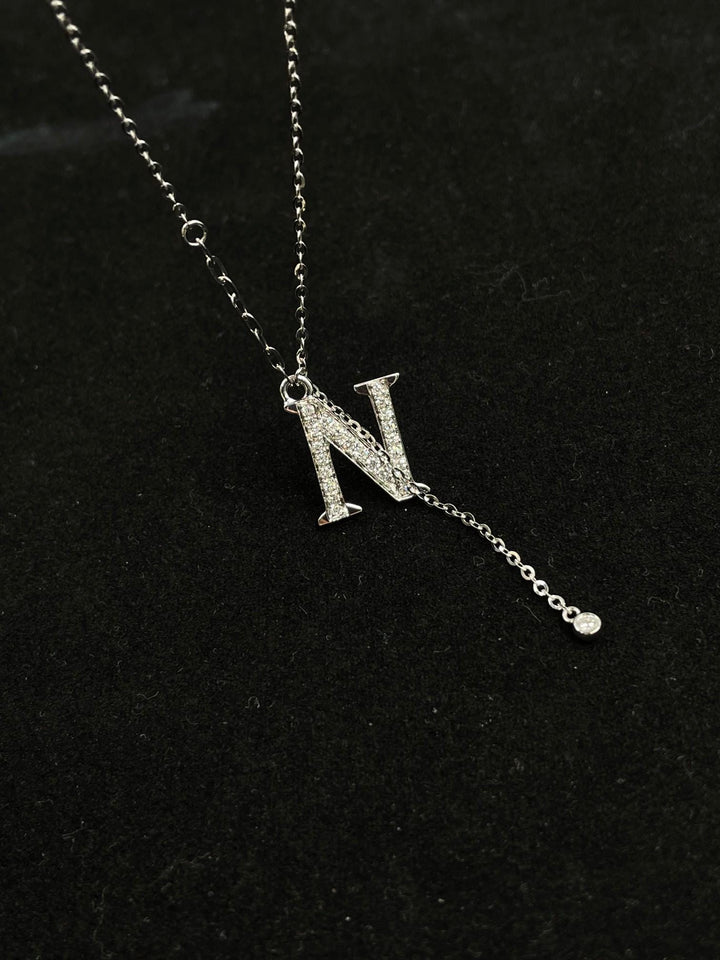 N, Worn With Intention — Diamond Lariat Initial Necklace · Minimal