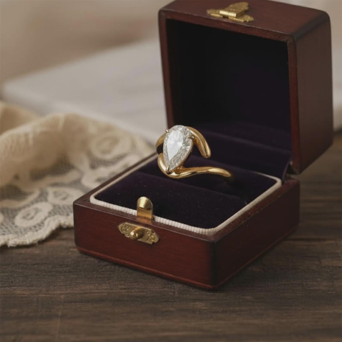 The Twist Makes It Hers — Pear Diamond Ring · 14K Gold Twisted Band