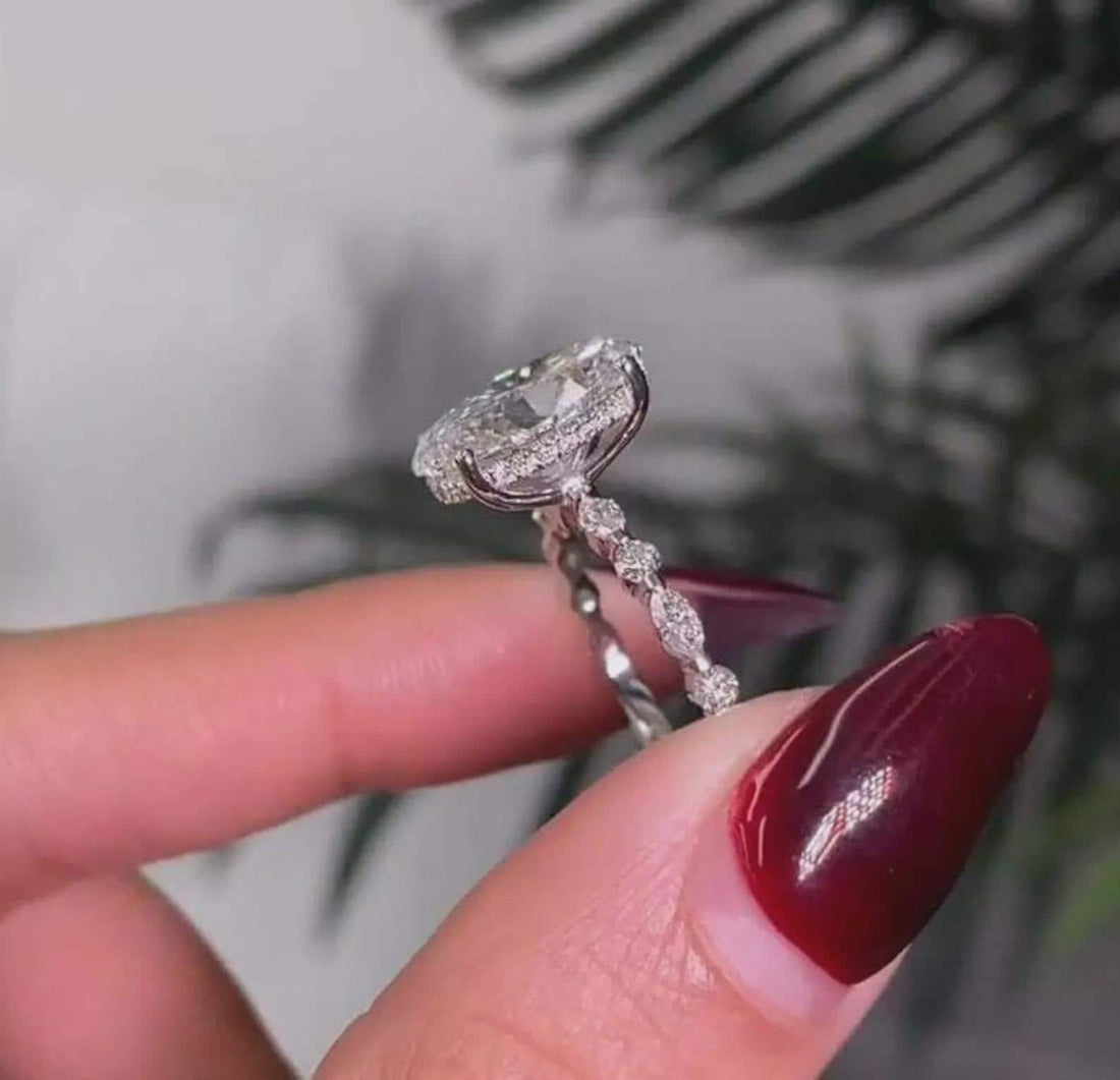 The One She'll Never Take Off — Oval Halo Ring · White Gold Pavé Band