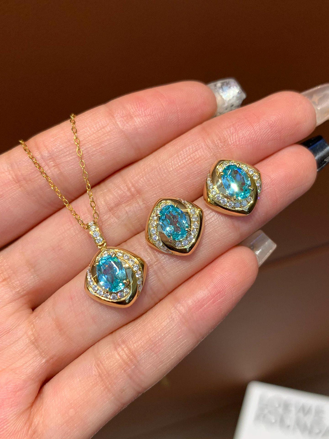 Blue from Ear to Neck — Oval Sapphire Halo Jewelry Set · Gold Plated Silver