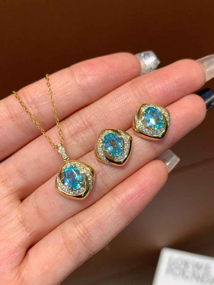 Blue from Ear to Neck — Oval Sapphire Halo Jewelry Set · Gold Plated Silver