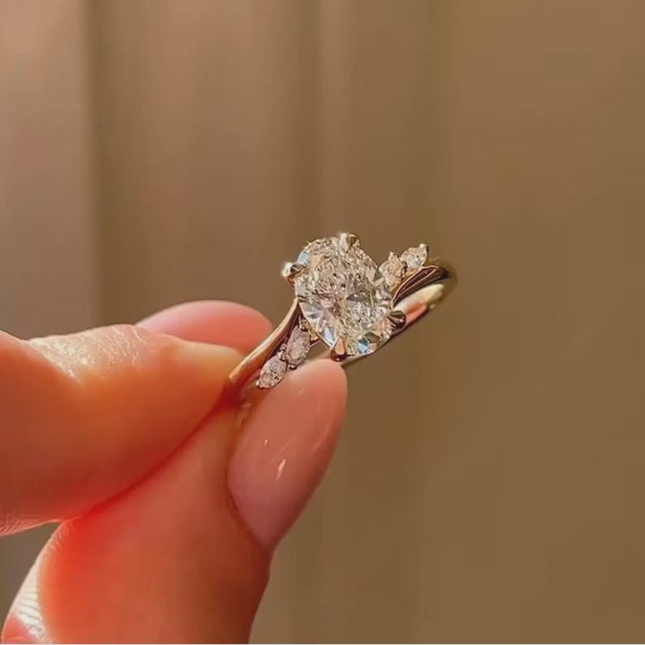 Twist of Brilliance — Oval CVD Diamond Ring with Marquise Side Stones