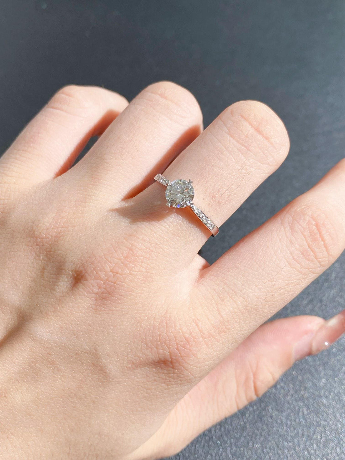 Brilliant Beyond Comparison — Round Moissanite Solitaire · White Gold Pavé