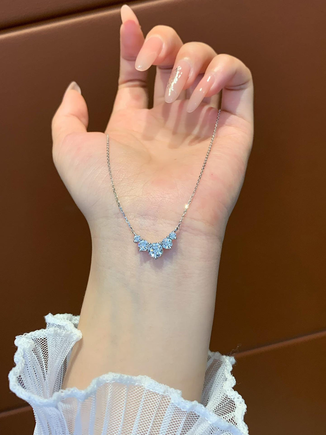 Three Points of Fire — Moissanite Three Stone Pendant · Sterling Silver
