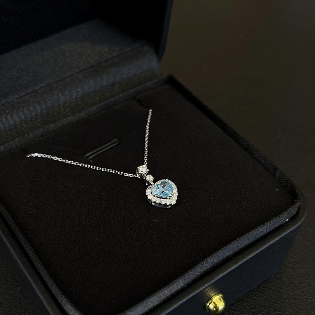Heart Full of Blue — Blue Heart Pendant Necklace · Sterling Silver Halo