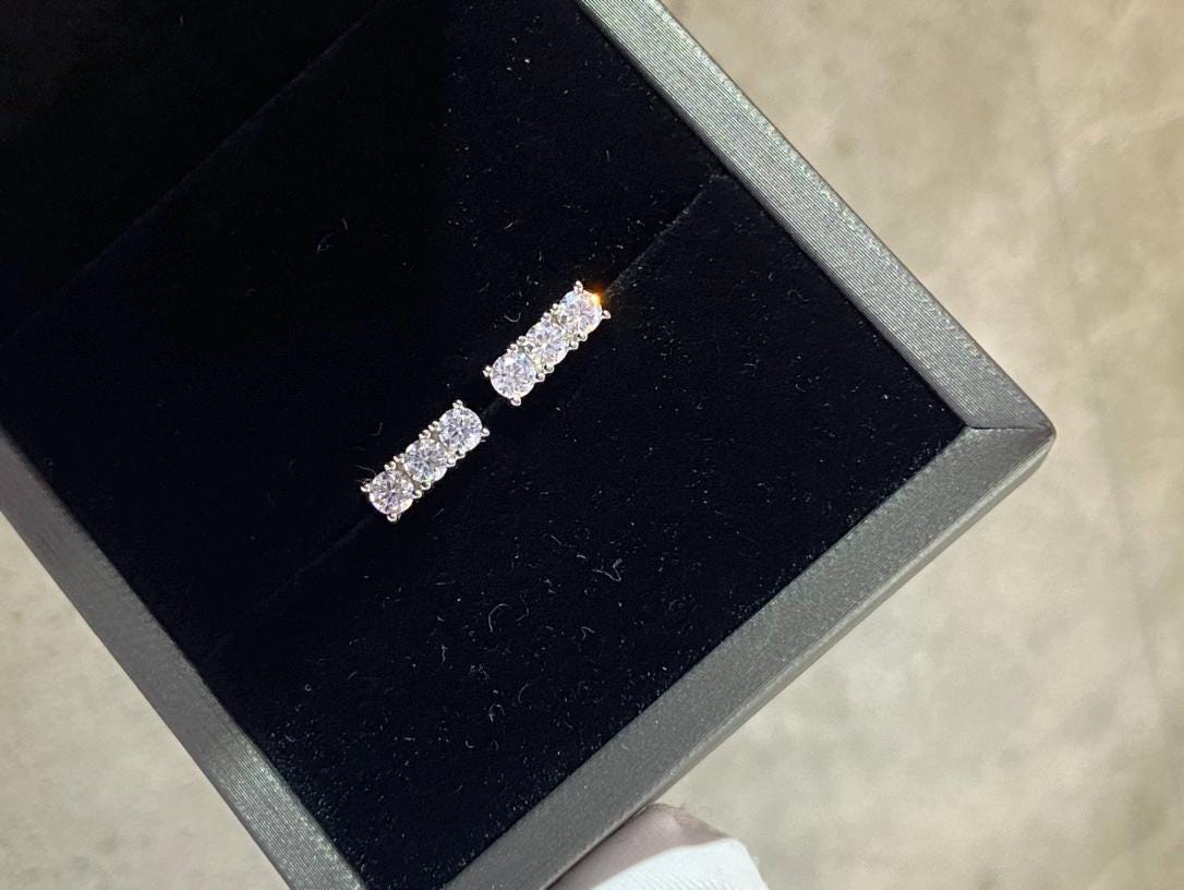 Pavé Letter Play — CZ Double C Earrings · Silver Plated