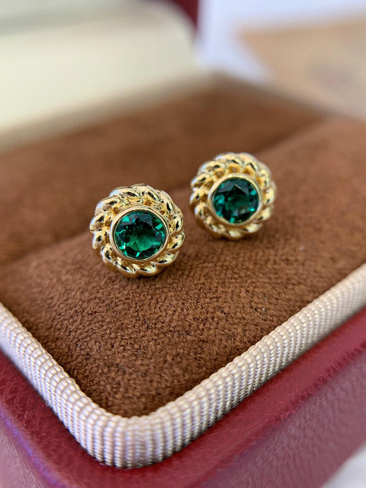 Green at the Center — Emerald CZ Sunburst Studs · Vintage Gold Halo