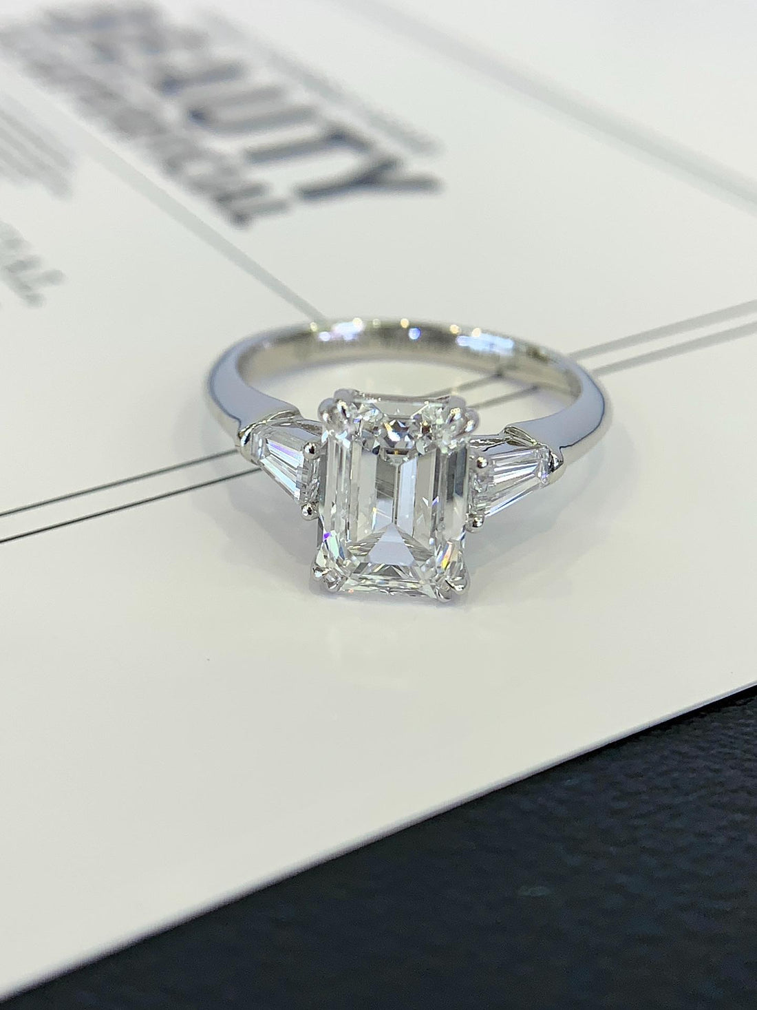 The Architect's Engagement Ring — Emerald Cut with Baguette Sides · 14K White Gold